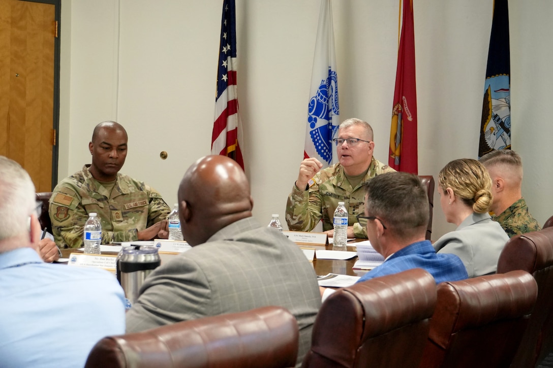 People in conference room.