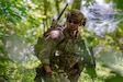 Staff Sgt. Austin Duck, a team lead in the Kentucky Air National Guard’s 123rd Explosive Ordnance Disposal flight, leads his team during a training exercise at Muscatatuck Urban Training Center in Butlerville, Indiana, July 26, 2025.