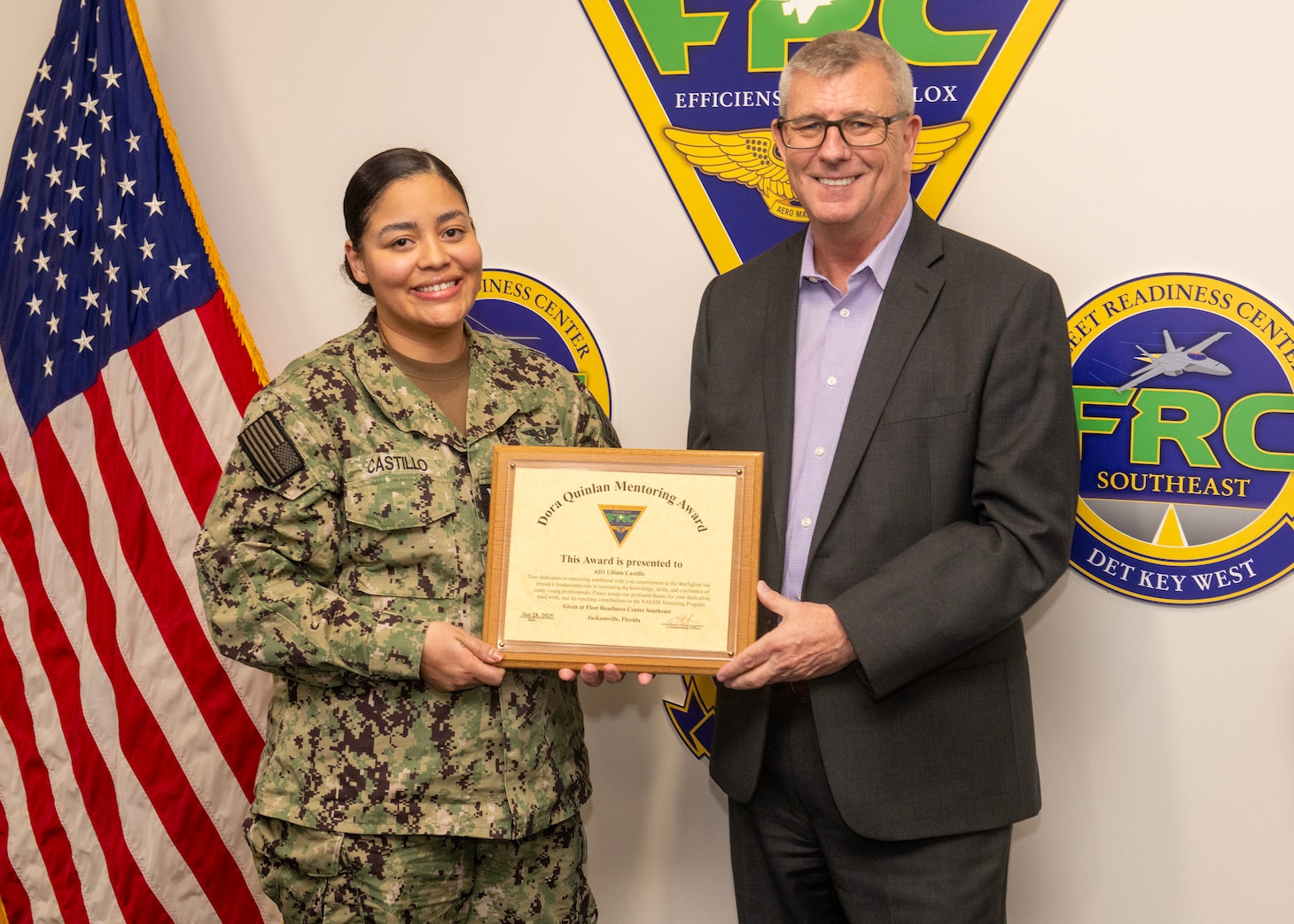 250128-N-BK290-1012
JACKSONVILLE, Fla. – Tim Pfannenstein, Fleet Readiness Center Southeast’s (FRCSE) executive director, presents Aviation Machinist’s Mate 1st Class Liliam Castillo with the Dora Quinlan Mentor of the Year award for providing outstanding mentorship to the workforce.