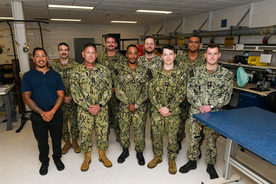 JACKSONVILLE, Fla. (June 12, 2024)
Fleet Readiness Center Southeast Detachment Jacksonville Miniature/Micro-miniature Electronics Repair and Module Test and Repair fiber optics work center pose for a photo. Detachment Jacksonville is the first Naval Air Systems Command I-Level fiber optics maintenance facility. (U.S. Navy Photo by Toiete Jackson)