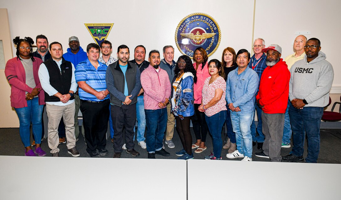JACKSONVILLE, Fla. (Feb.14, 2024)
Fleet Readiness Center Southeast’s Aviation Maintenance Advancement Solutions (AMAS) production and logistics team poses for a photo after winning the Common Aviation Support Equipment Program Office (PMA-260) Team of the Year award for its work supporting Portable Electronic Maintenance Aids (PEMAs). This is the first time the team has received the accolade. (U.S. Navy Photo by Toiete Jackson)