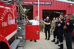 Chris Wysong, chief of Wayne Township Fire Department, gives a tour Aug. 22 to a delegation of four firefighters from the Serbian Volunteer Fire Department. The delegation spent time with both professional and volunteer fire departments to observe operations, share best practices, and foster international relationships.