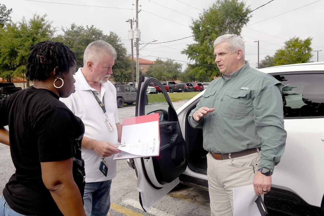 Michael Vance, a logistics management specialist with the U.S. Army Corps of Engineers Logistics Activity Assessment Branch, and Brittany Wallace, a logistics management specialist with the USACE Savannah District, conduct a government vehicle inspection at the Savannah District’s Hunter Army Airfield Resident Office with Resident Engineer Todd McGalliard.
As part of the Command Logistics Review Program, Vance visited the district with a five-person team to assess logistic readiness and provide actionable guidance. The team conducted its initial assessment in April; this visit was an in-person follow-up.
