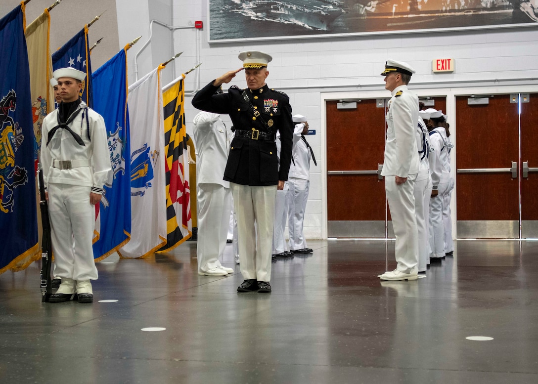 250821-N-GU344-1211 GREAT LAKES, Ill. (Aug. 21, 2025) – U.S. Marine Corps Lt. Gen. William Bowers, commanding general, Marine Corps Recruiting Command (center), is piped aboard during pass-in-review onboard U.S. Navy Recruit Training Command in Great Lakes, Aug. 21, 2025. Training is approximately nine weeks and all enlistees in the U.S. Navy begin their career at the command. More than 40,000 recruits train annually at the Navy's only boot camp. (U.S. Navy photo by Mass Communication Specialist 1st Class John Suits)