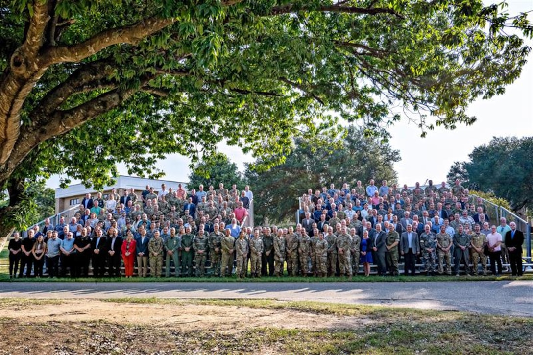 Group of people posing for photo
