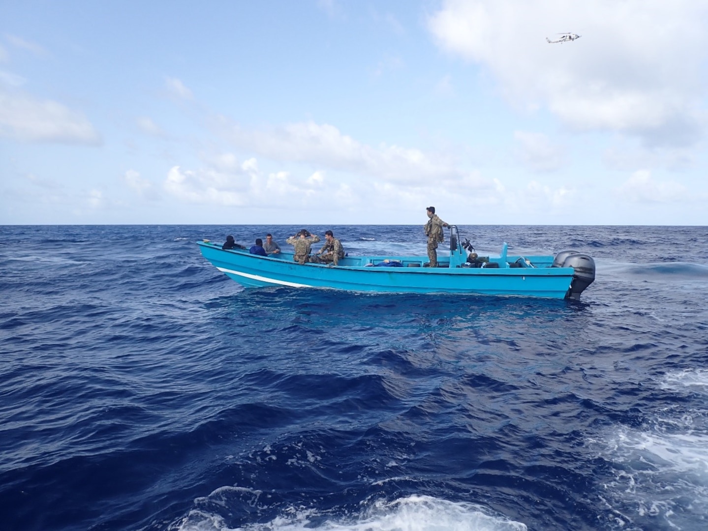 U.S. Coast Guard Law Enforcement Detachment 108 crew interdicts a suspicious vessel approximately 100 miles north of Aruba, Aug. 7, 2025. The crew of USS Minneapolis-Saint Paul (LCS 21) provided support during the interdiction, resulting in the seizure of approximately 2,701 pounds of cocaine. (U.S. Coast Guard photo)