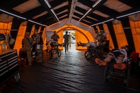“Disaster victims” are medically treated after being rescued from a simulated explosion during a CERFP (CBRNE (Chemical, Biological, Radiological, Nuclear, and Explosive) Enhanced Response Force Package) training exercise at Camp Rilea, Warrenton, Oregon on August 14, 2025.
