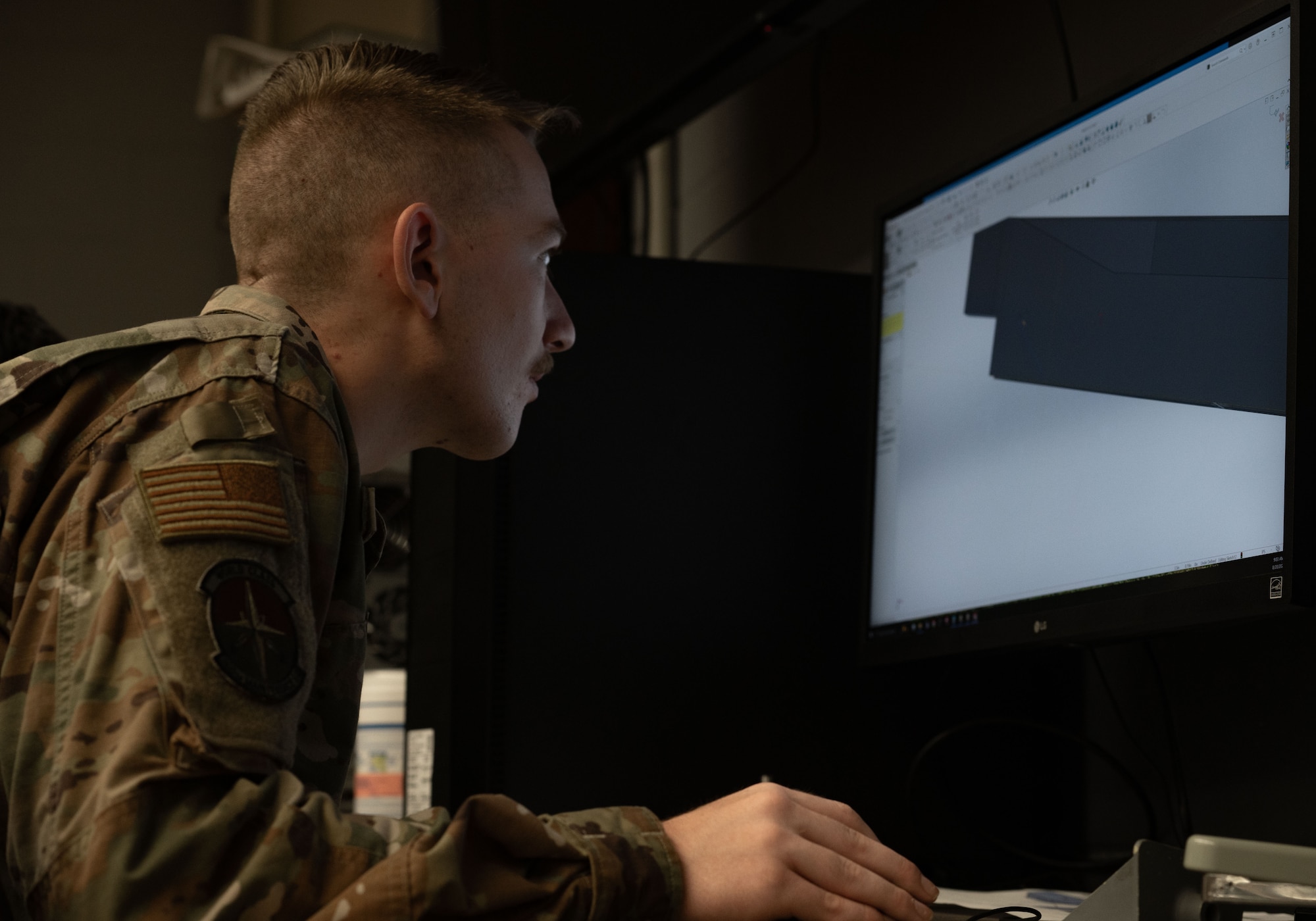 U.S. Air Force Airman John Paul Bertotti, 305th Maintenance Squadron aircraft metals technology apprentice, works on a 3-dimensional drawing at Joint Base McGuire-Dix-Lakehurst, N.J., Aug. 20, 2025. The 305th MXS fabricates products to ensure aircraft at JB MDL can fulfill mission requirements. (U.S. Air Force photo by Airman Haeleigh Bayle)