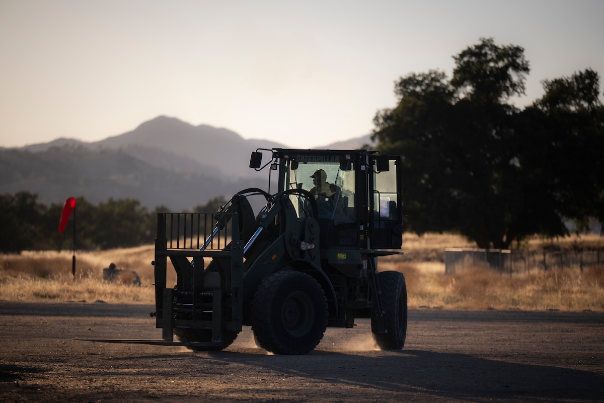 Airman drives forklift