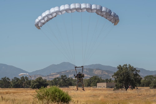 A pararescueman prepares to land