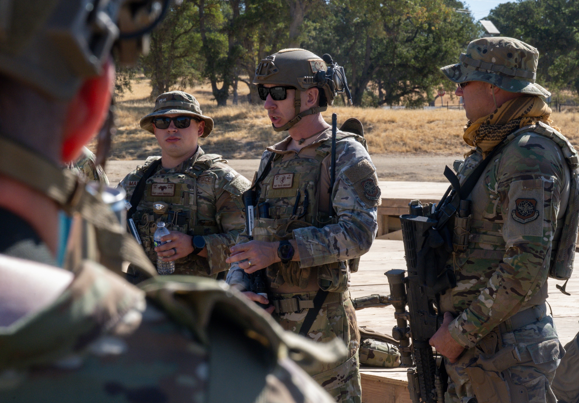Airman speaks to group