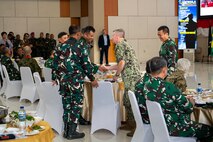 Adm. Samuel J. Paparo, commander of U.S. Indo-Pacific Command, shakes hands with Lt. Gen. Tandyo Budi Revita, deputy commander of the Indonesian National Armed Forces, during the opening ceremony for Super Garuda Shield 2025, in Jakarta, Indonesia, Aug. 25, 2025.