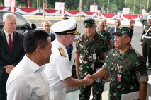 Adm. Samuel J. Paparo, commander of U.S. Indo-Pacific Command, greets senior military officials at the Ministry of Defense in Jakarta, Indonesia, Aug. 24, 2025.