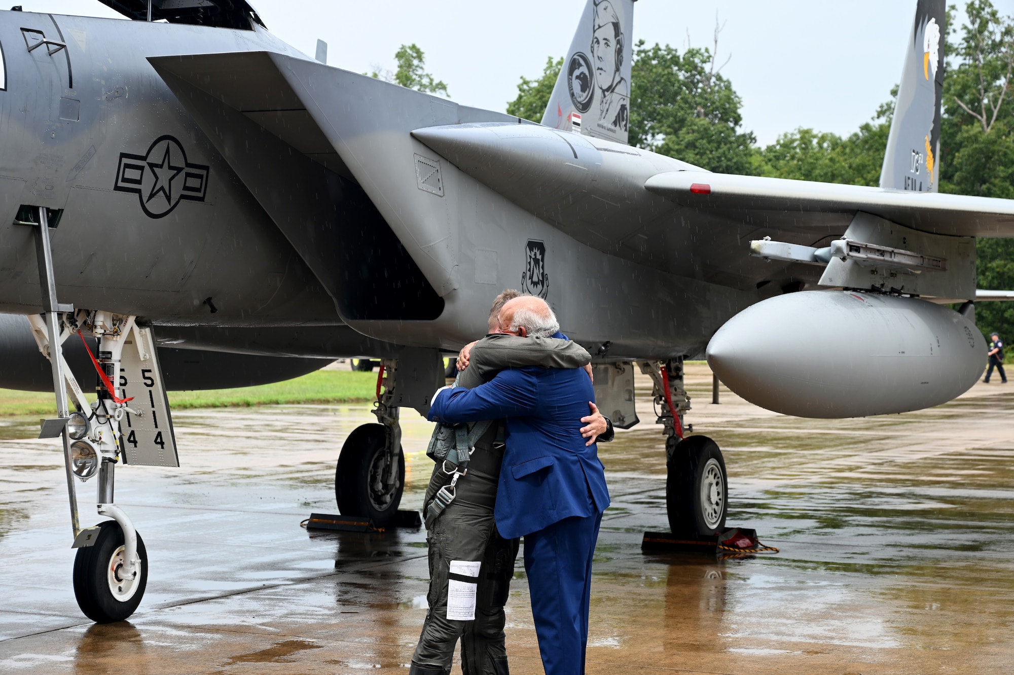 Two people hug