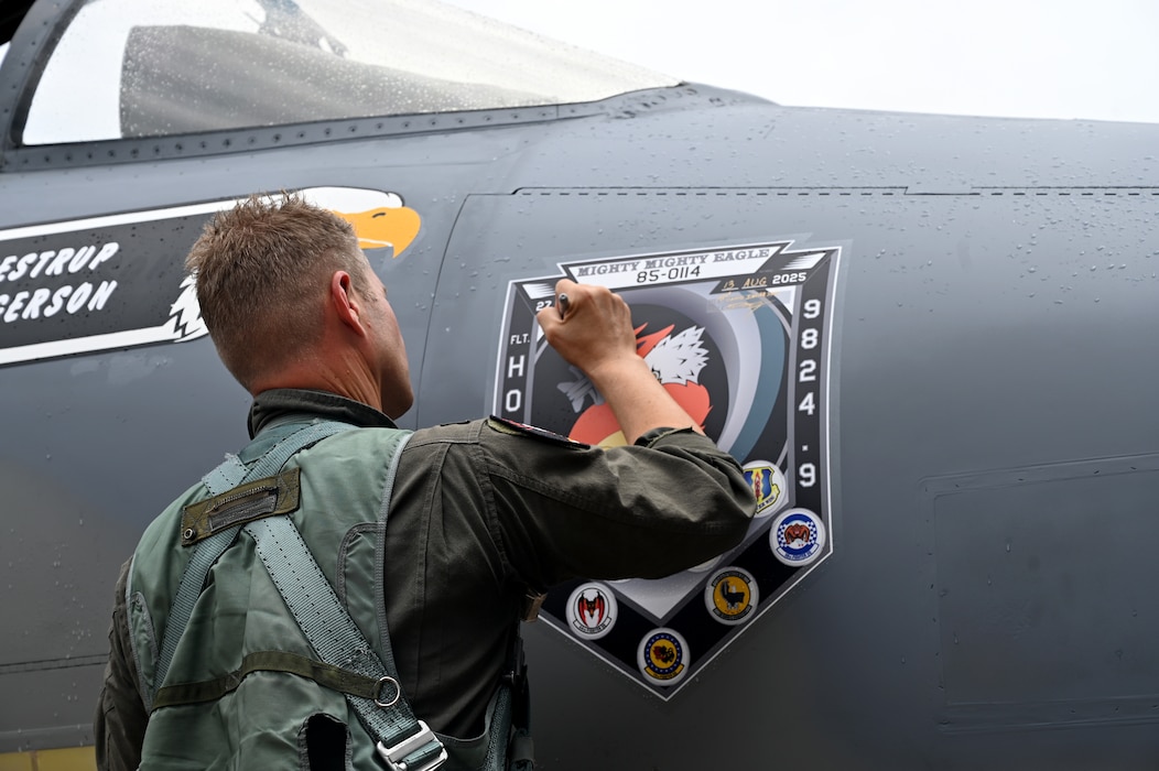 Person signs aircraft