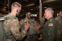 Adm. Samuel J. Paparo, commander of U.S. Indo-Pacific Command, met with Soldiers assigned to 11th Airborne Division during Northern Edge 25 on Joint Base Elmendorf-Richardson, Alaska, Aug. 19, 2025. The 11th Airborne Division delivers decisive large-scale combat operations in extreme cold weather, mountainous, and high-latitude environments, executing expeditionary operations worldwide and conducting Multi-Domain Operations throughout the Indo-Pacific theater and the Arctic. USINDOPACOM is committed to enhancing stability in the Indo-Pacific region by promoting security cooperation, encouraging peaceful development, responding to contingencies, deterring aggression and, when necessary, prevailing in conflict. (U.S. Army photo by Sgt. Austin Riel)