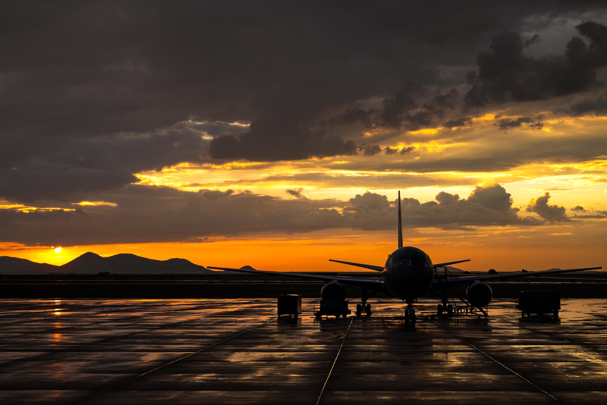 A U.S. Air Force KC-46 Pegasus aircraft sits on the flightline during sunrise at Altus Air Force Base, Oklahoma, Aug. 20, 2025. The aircraft was staged to support “Vapor Trails”, a joint medical exercise focused on aeromedical evacuation and critical care air transport training. (U.S. Air Force photo by Airman 1st Class Lauren Torres)