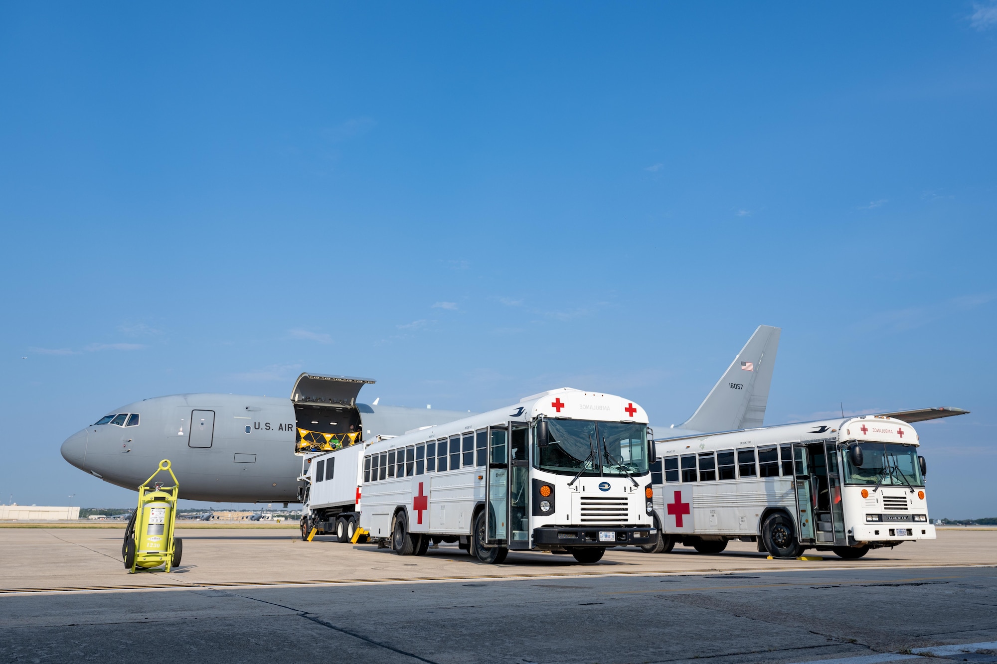 A U.S. Air Force KC-46 Pegasus aircraft, assigned to the 97th Air Mobility Wing sits on the flightline at Kelly Field, San Antonio, Texas, Aug. 21, 2025. The aircraft was loaded with medical equipment and personnel to conduct “Vapor Trails”, a joint mass-casualty and medical readiness exercises. (U.S. Air Force photo by Airman 1st Class Lauren Torres)