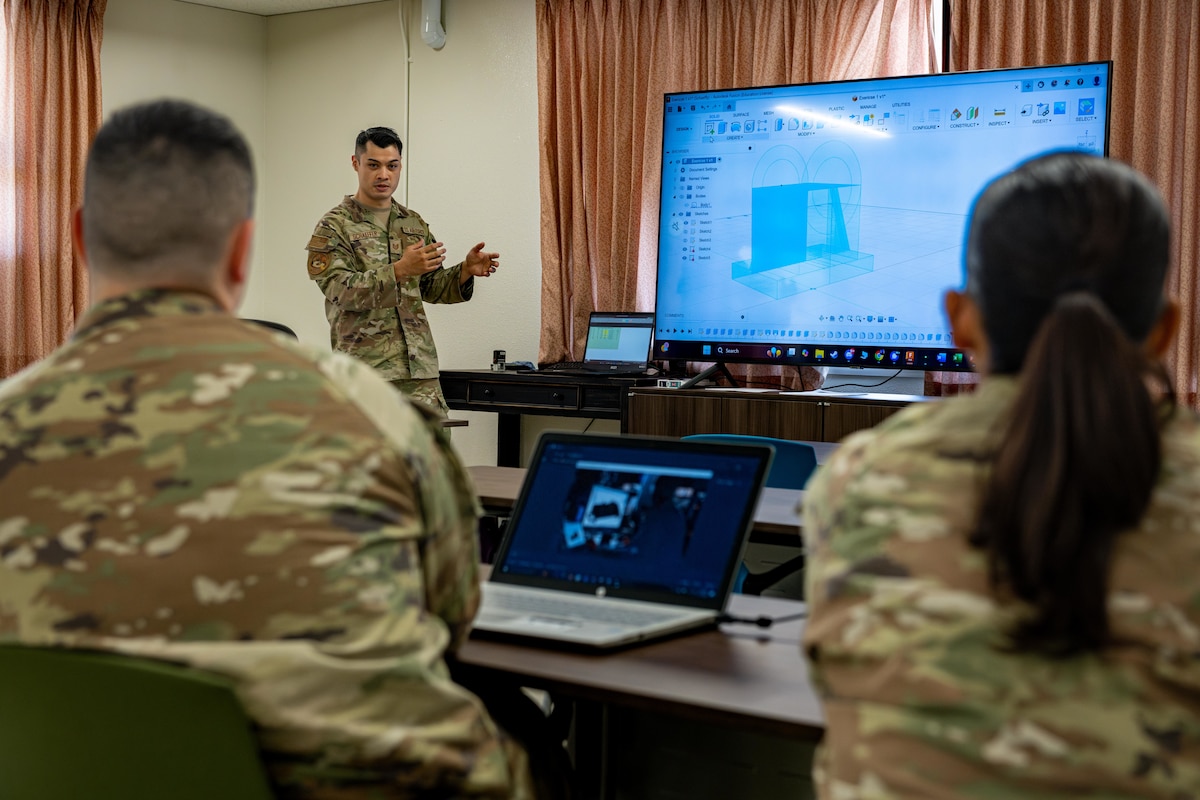 U.S. Air Force Tech. Sgt. Andrew Schaeffer, Project Arc director of innovation, lectures a manufacturing and design course.