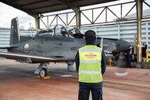 A Royal Thai Air Force pilot and U.S. Air Force Weapons Systems Officer, 137th Special Operations Wing, Oklahoma Air National Guard, prepare to taxi for their historical flight together during Enduring Partners on August 18, 2025 at Korat Royal Thai Air Force Base, Thailand.
