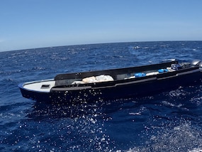 U.S. Coast Guard Law Enforcement Detachment 404 crew interdicts a suspicious vessel approximately 52 miles north of Carabobo, Venezuela, Aug. 2, 2025. The crew of HNLMS Friesland (P-842) and an embarked Helicopter Interdiction Tactical Squadron (HITRON) aircrew provided tactical support during the interdiction, resulting in the seizure of 3,618 pounds of marijuana. (U.S. Coast Guard photo)