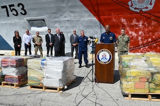 U.S. Coast Guard Capt. John McWhite, commanding officer of the Coast Guard Cutter Hamilton (WMSL 753), speaking at press conference for an offload of 76,140 lbs of illicit narcotics at Port Everglades, Florida, on August 25, 2025. This was the single largest offload in the Coast Guard's history. (U.S. Coast Guard Petty Officer 3rd Class Nicholas Strasburg)