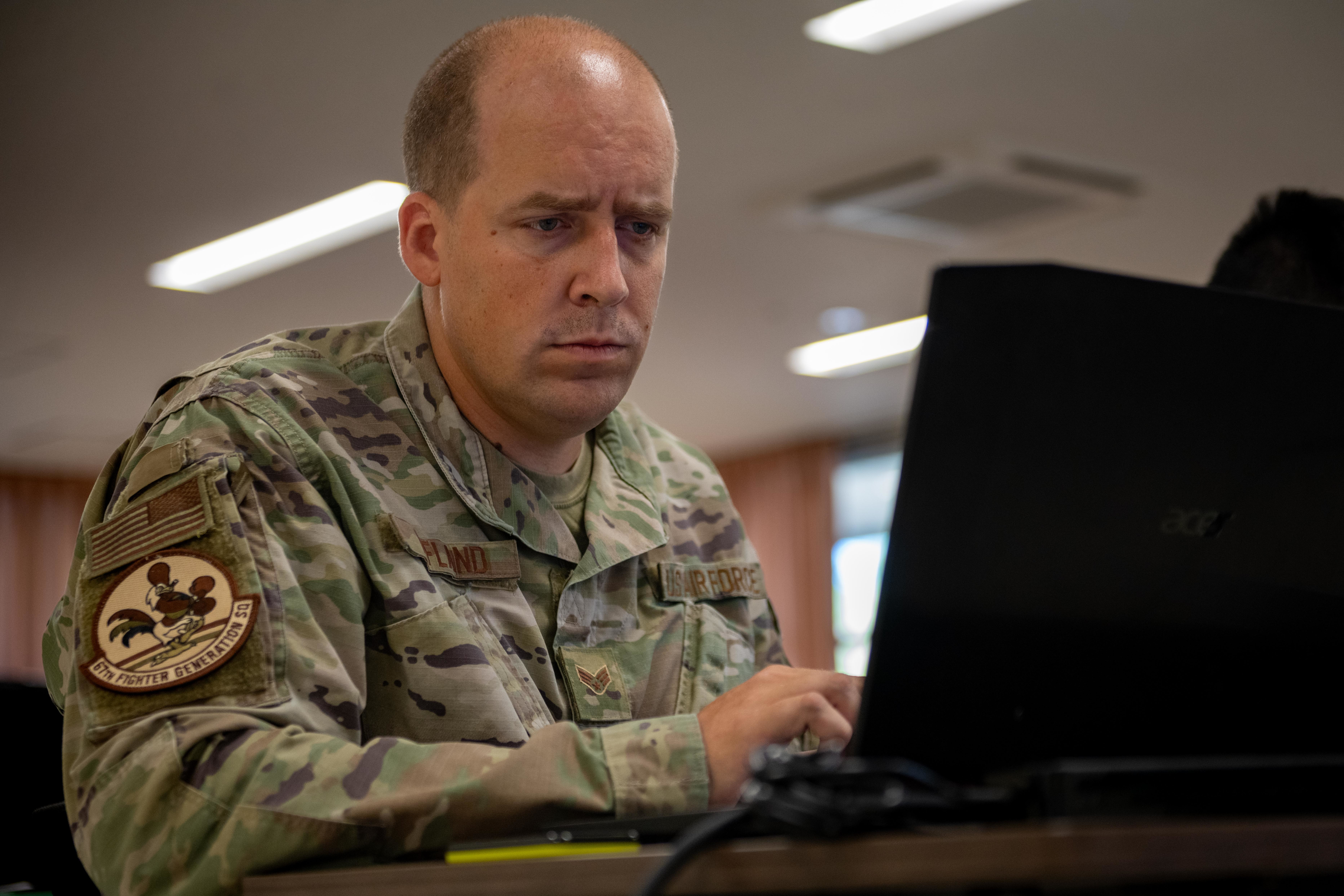 U.S. Air Force Senior Airman Luke Effland, 67th Fighter Generation Squadron engines specialist, sets up 3D printing software during a manufacturing and design course at Misawa Air Base, Japan, Aug. 18, 2025. During the course, students gain practical 3D printing experience to quickly create critical parts, boosting the 35th Fighter Wings and the Air Force’s agility and problem-solving capabilities. (U.S. Air Force photo by Airman Hannah Bench)