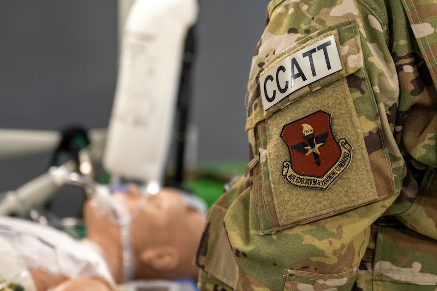 U.S. Air Force Air Education and Training Command and Critical Care Air Transport Team (CCATT) patches are displayed during the “Vapor Trails” exercise at Kelly Airfield, San Antonio, Texas, Aug. 21, 2025. CCATT is a three-person medical team, usually consisting of a physician, a critical care nurse, and a respiratory therapist. (U.S. Air Force photo by Airman 1st Class Lauren Torres)