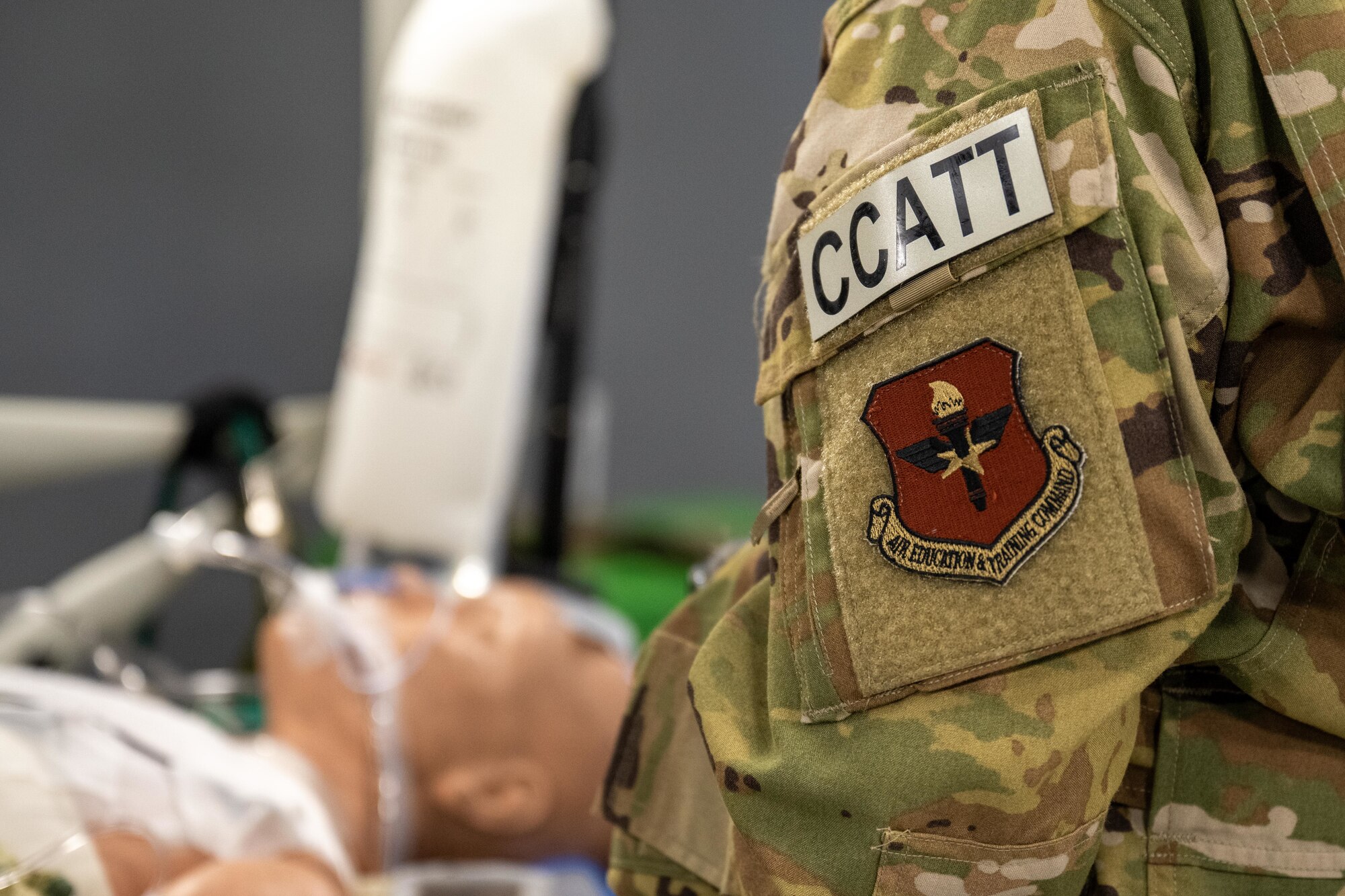 U.S. Air Force Air Education and Training Command and Critical Care Air Transport Team (CCATT) patches are displayed during the “Vapor Trails” exercise at Kelly Airfield, San Antonio, Texas, Aug. 21, 2025. CCATT is a three-person medical team, usually consisting of a physician, a critical care nurse, and a respiratory therapist. (U.S. Air Force photo by Airman 1st Class Lauren Torres)