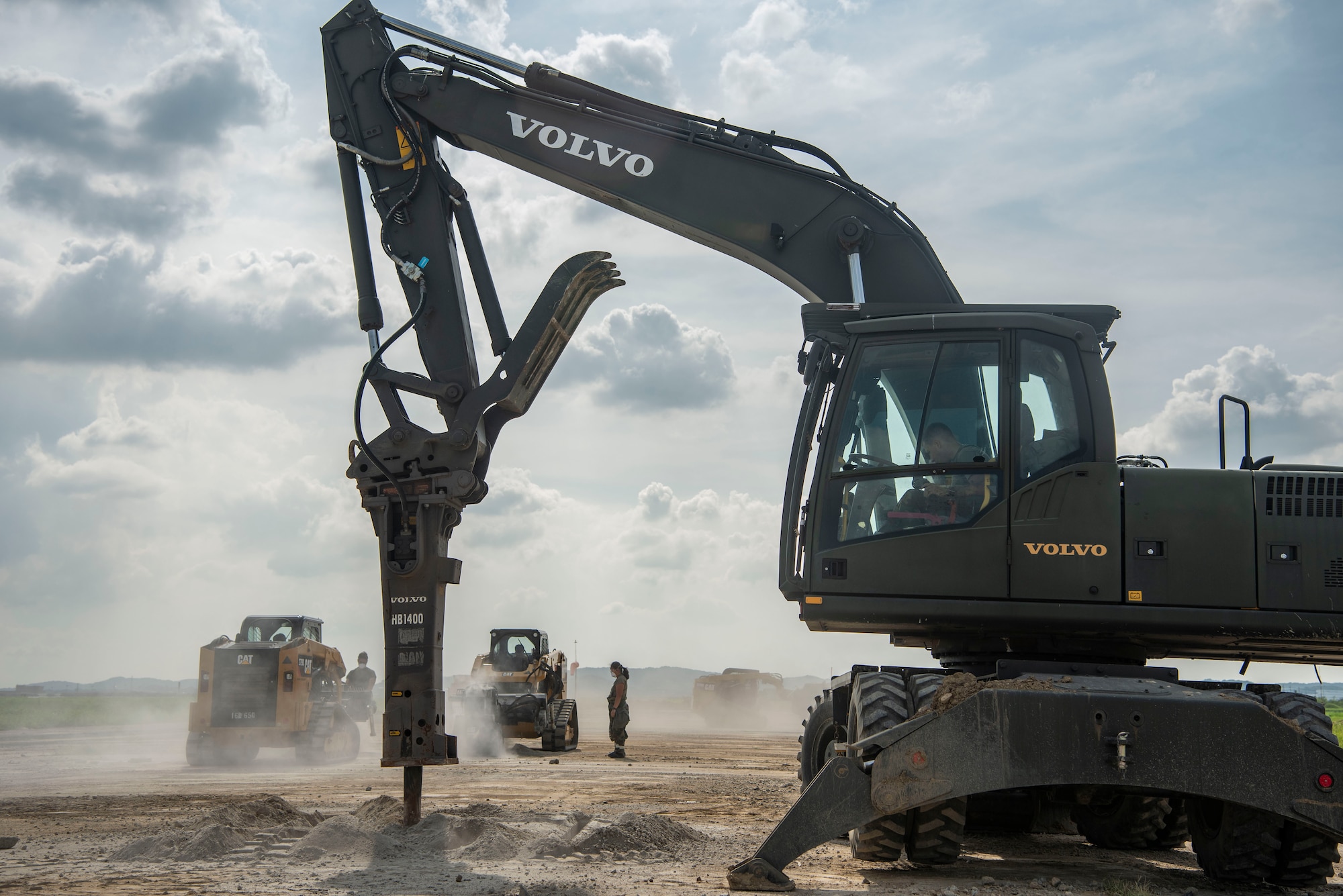 A U.S. Air Force Airman assigned to the 51st Civil Engineer Squadron uses a vehicle mounted jackhammer to break up portions of unusable concrete to conduct rapid airfield damage repair during exercise Ulchi Freedom Shield 25 at Osan Air Base, Republic of Korea, Aug. 20, 2025