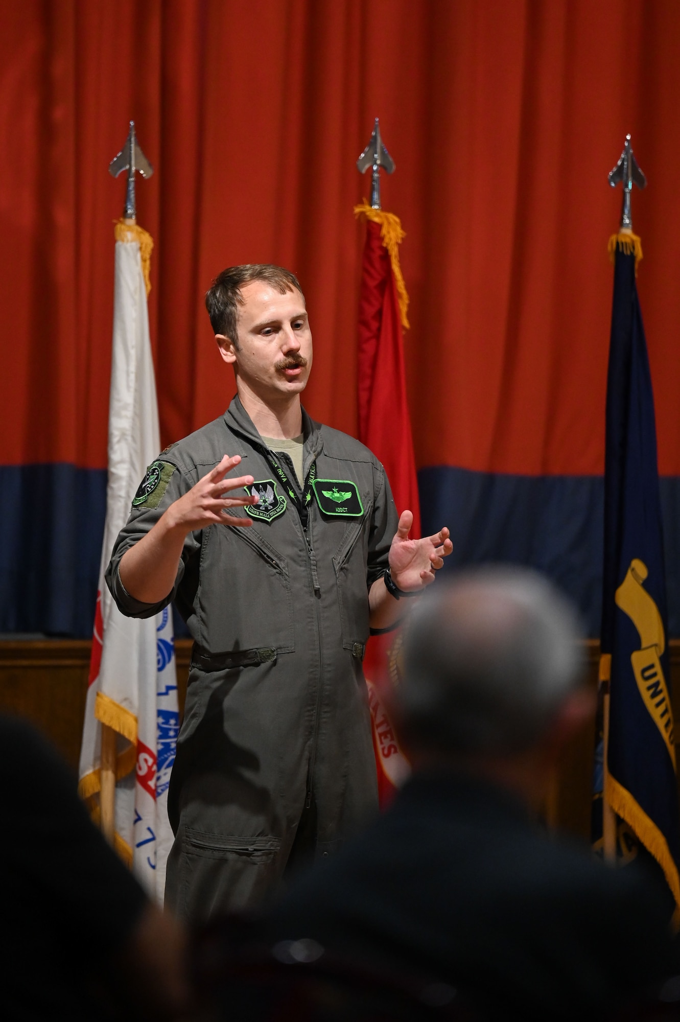U.S. Air Force Maj. Andrew Marty, 495th Fighter Squadron F-35 pilot, speaks during a Q&A panel held for the 2025 Retiree Appreciation Day at RAF Mildenhall, England, Aug. 15, 2025.