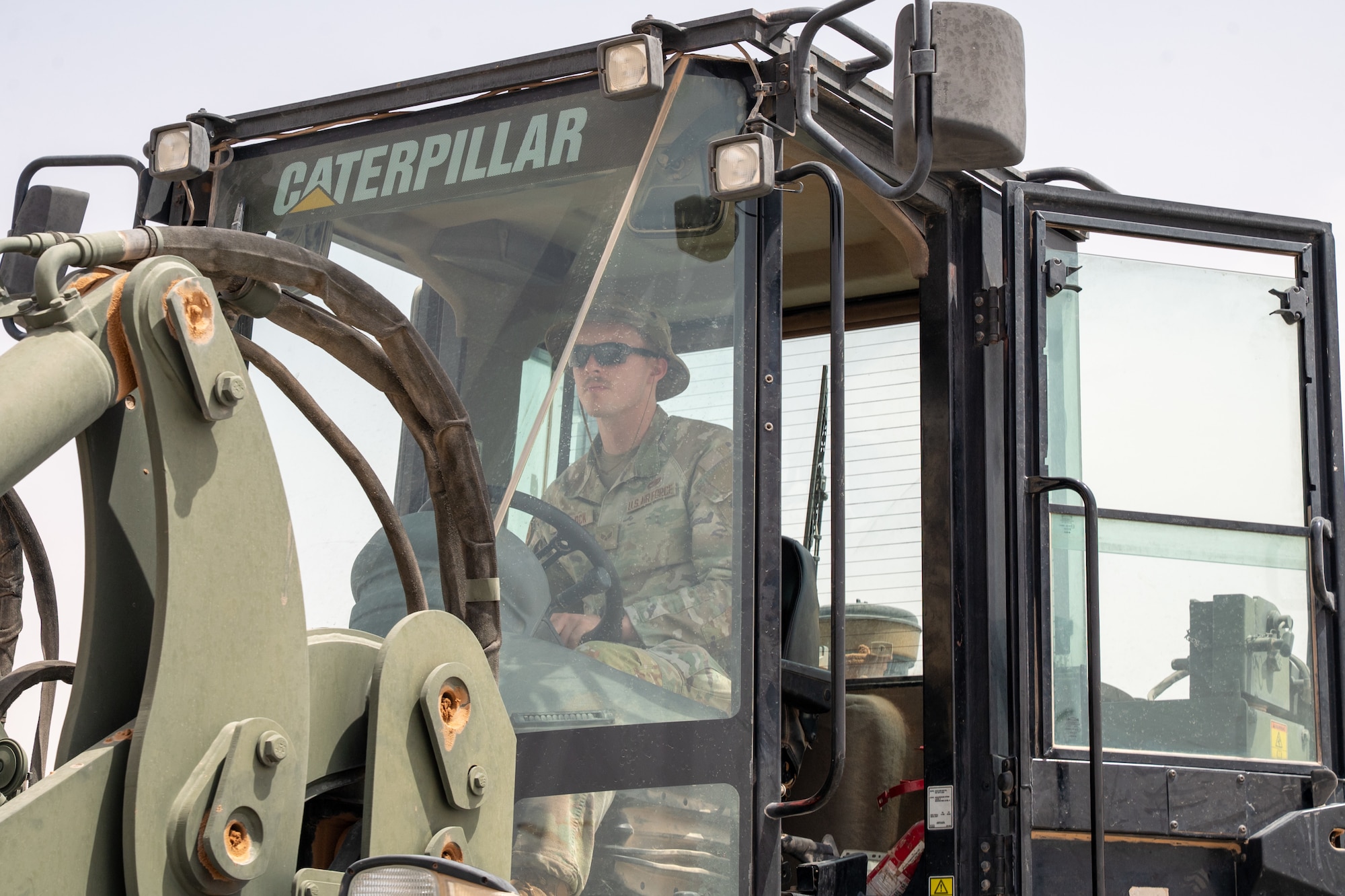 Airman operates a forklift