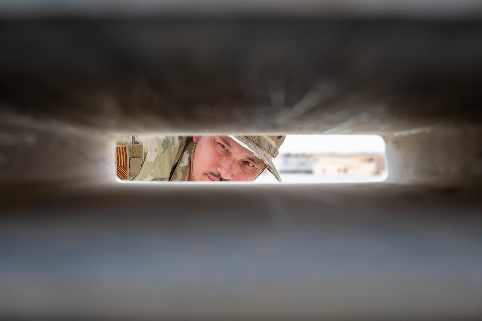 Airman inspects a cargo shipment