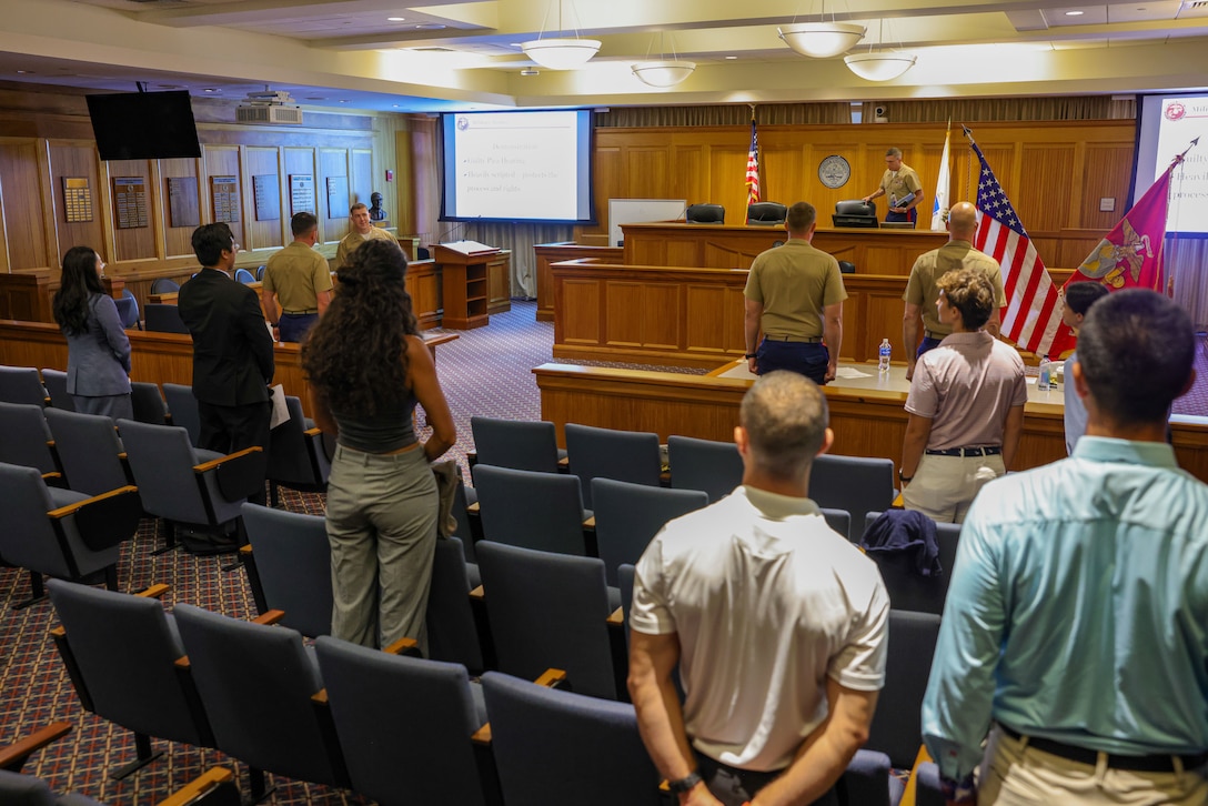 U.S. Marine Corps judge advocates conduct a mock trial for law students at Suffolk University Law School during Marine Week Boston, Aug. 25, 2025. During Marine Week Boston, Marines with Marine Corps Recruiting Command shared Marine Corps traditions and opportunities with the local community. (U.S. Marine Corps photo by Sgt. Aidan Hekker)