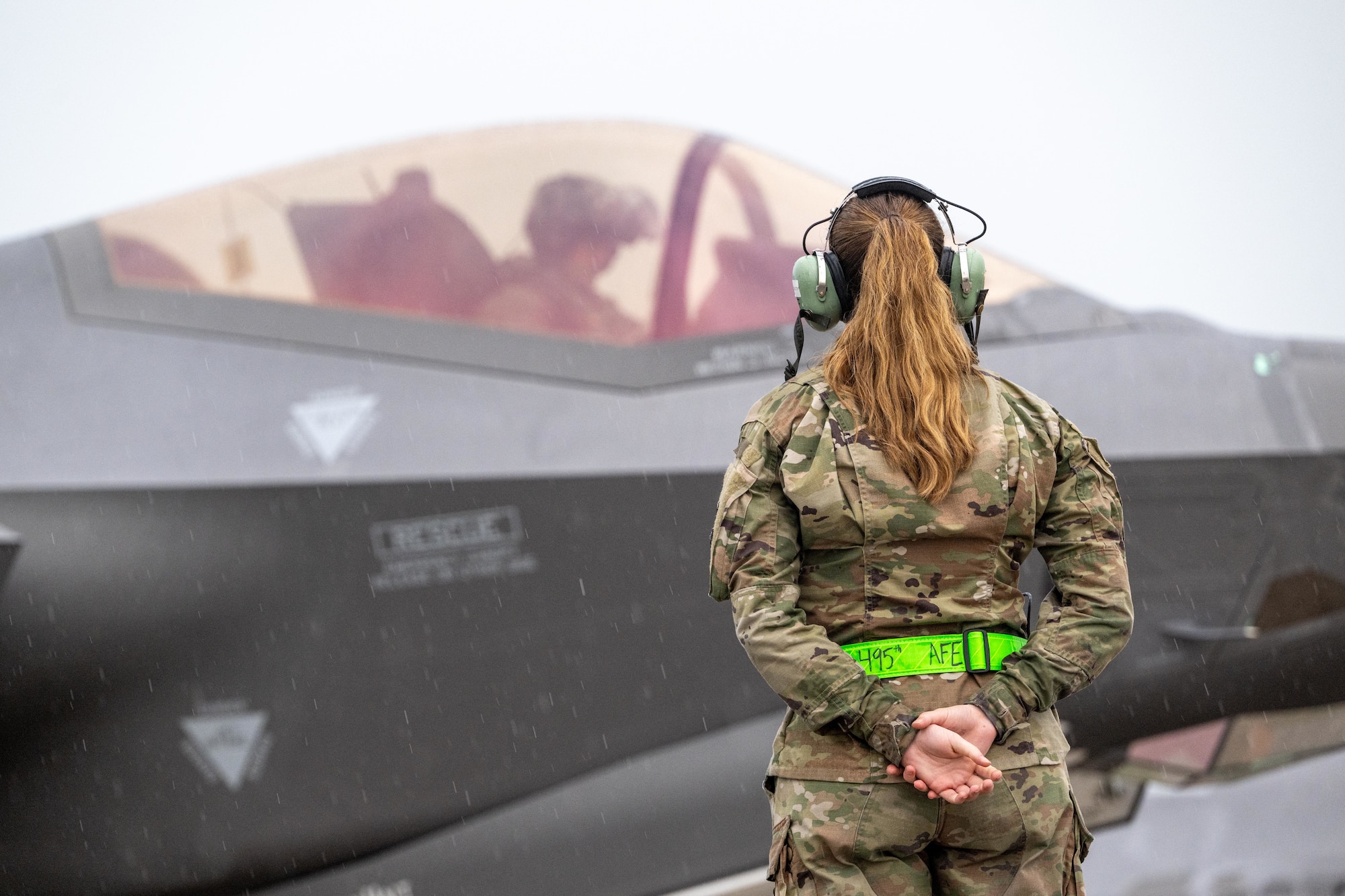 Aircrew Airman in front of Jet