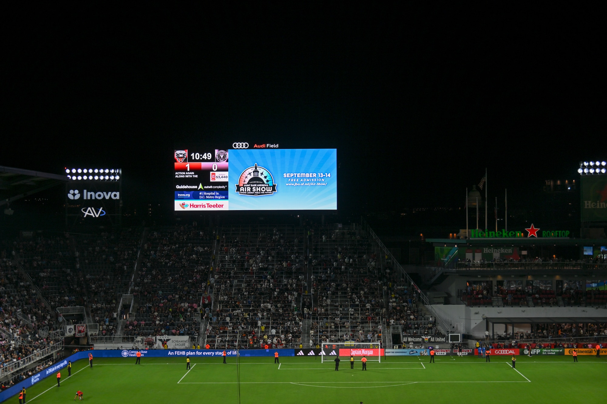 A jumbotron displays a graphic promoting the 2025 Joint Base Andrews Air Show during halftime at Audi Field in Washington, D.C., Aug. 23, 2025. The air show is scheduled for Sept. 13–14, 2025, and will feature aerial demonstrations, static displays, and performances highlighting the evolution of airpower.