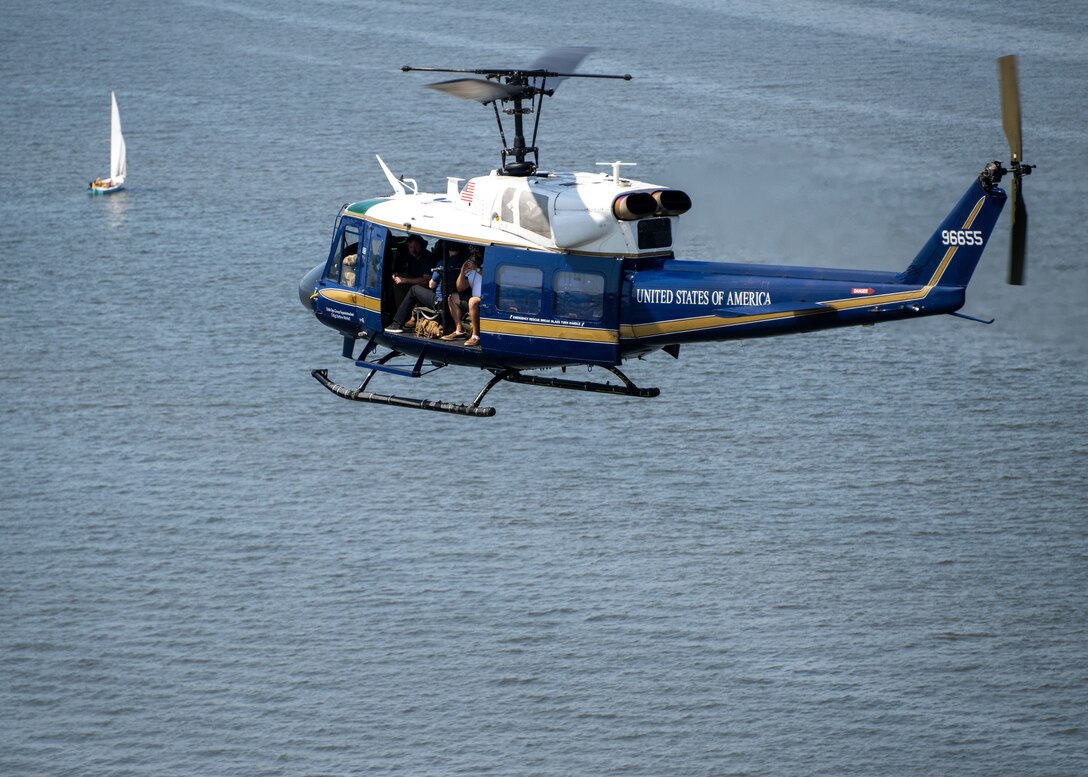 A UH-1N Huey helicopter assigned to the 1st Helicopter Squadron flies over the Potomac River in Washington, D.C., July 4, 2024.