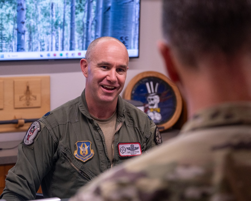 U.S. Air Force Lt. Col. Daniel Fletcher, 310th Fighter Squadron instructor pilot, meets with Maj. Gen. Trent Davis, Department of the Air Force chief of chaplains, during a squadron visit, Aug. 22, 2025, at Luke Air Force Base, Arizona.