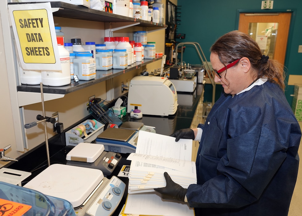 JOINT BASE SAN ANTONIO-FORT SAM HOUSTON - (Aug. 21, 2025) – April Ford, a chemical hygienist specialist assigned to Naval Medical Research Unit (NAMRU) San Antonio, reviews Safety Data Sheets (SDSs) within command laboratory spaces at the Battlefield Health and Trauma Research Institute. NAMRU San Antonio recently procured a digital SDS database system for use on non-networked computer tablets to replace all physical SDS binders. The Occupational Safety and Health Administration Hazard Communication standard 1910.1200 requires SDSs to be readily accessible during each work shift for all hazardous chemicals in the workplace. NAMRU San Antonio, part of Navy Medicine Research & Development (NMR&D), conducts gap-driven combat casualty care, craniofacial, and directed energy research in support of Navy, Marine Corps and joint U.S. warfighter health readiness and lethality while engaged in routine and expeditionary operations. (U.S. Navy photo by Burrell Parmer, NAMRU San Antonio Public Affairs/Released)