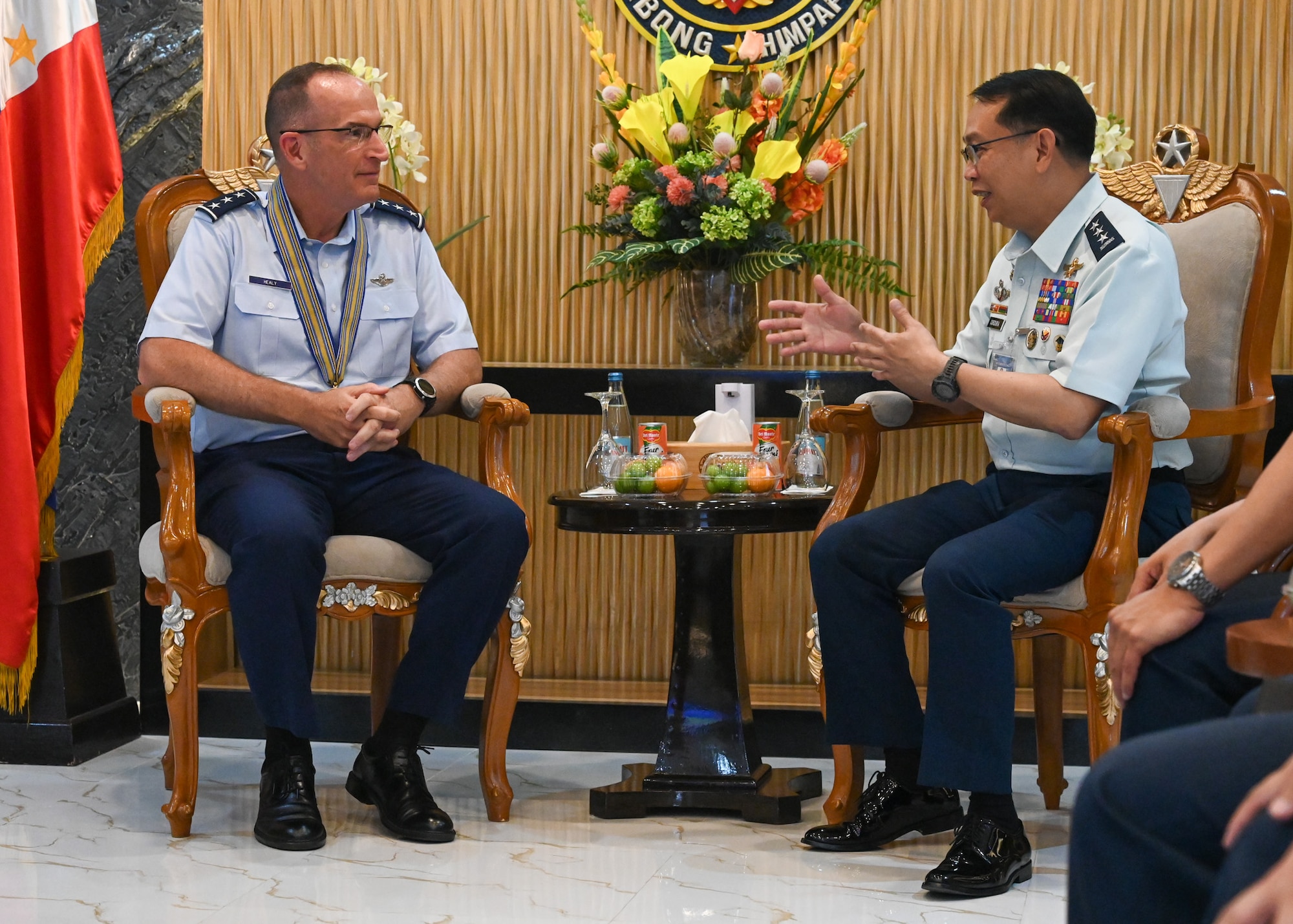 Two men sitting talking