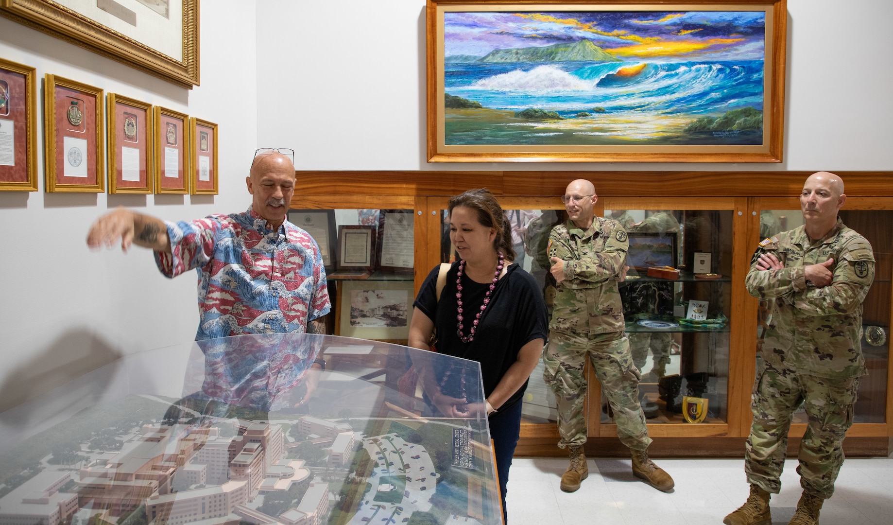 Mr. Joel Jenkins, Tripler Army Medical Center protocol
officer, provides U.S. Representative Jill Tokuda a tour
of TAMC on Aug 21. (from left, Joel Jenkins, U.S. Rep. Jill Tokuda, 
Chief Medical Officer Col. Erik Johnson, TAMC commander
Col. William Bimson)