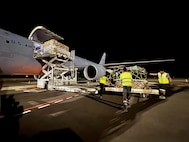 Airmen from the 157th Air Refueling Wing and airport personnel from Amílcar Cabral International Airport offload a KC-46 Pegasus with 33,000 pounds of cargo on the flight line Aug. 18, 2025