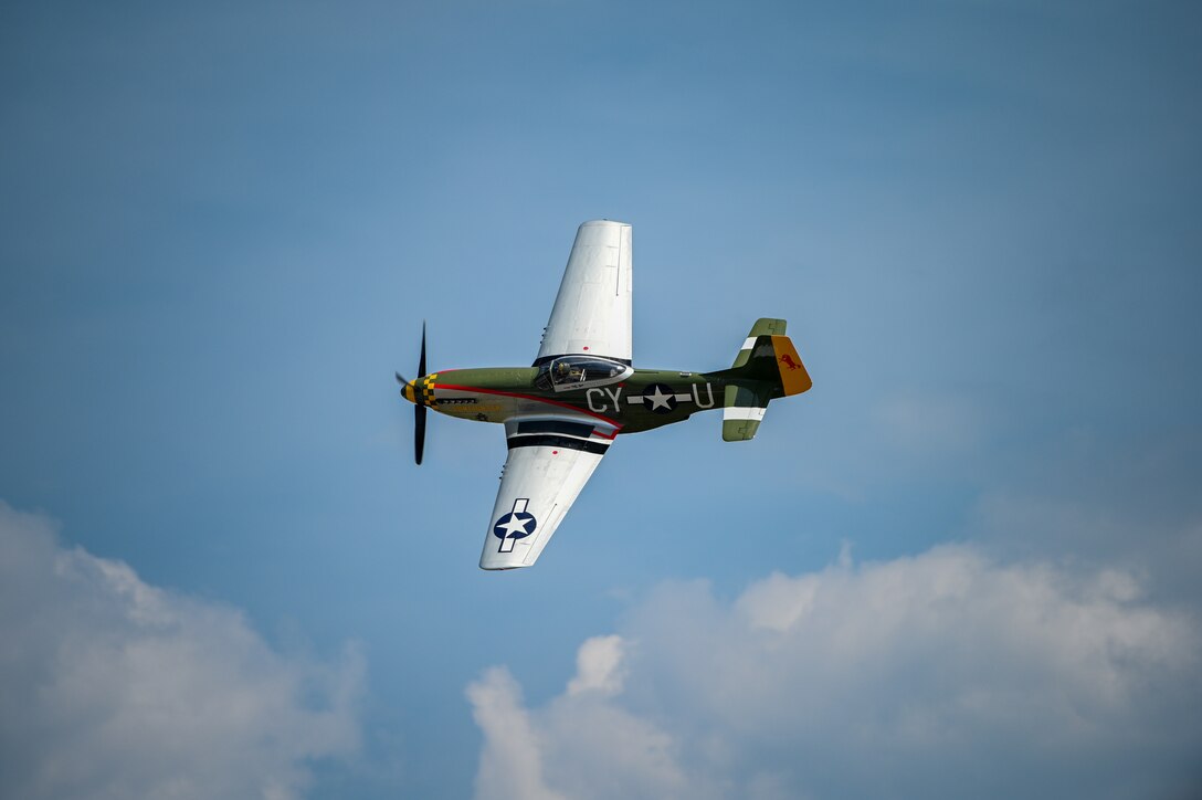 The pilot of “Gunfighter”, a P-51D Mustang, performs arial maneuvers during the 2024 Defenders of Freedom Air and Space Show on Offutt Air Force Base, Nebraska, Aug. 25, 2024.