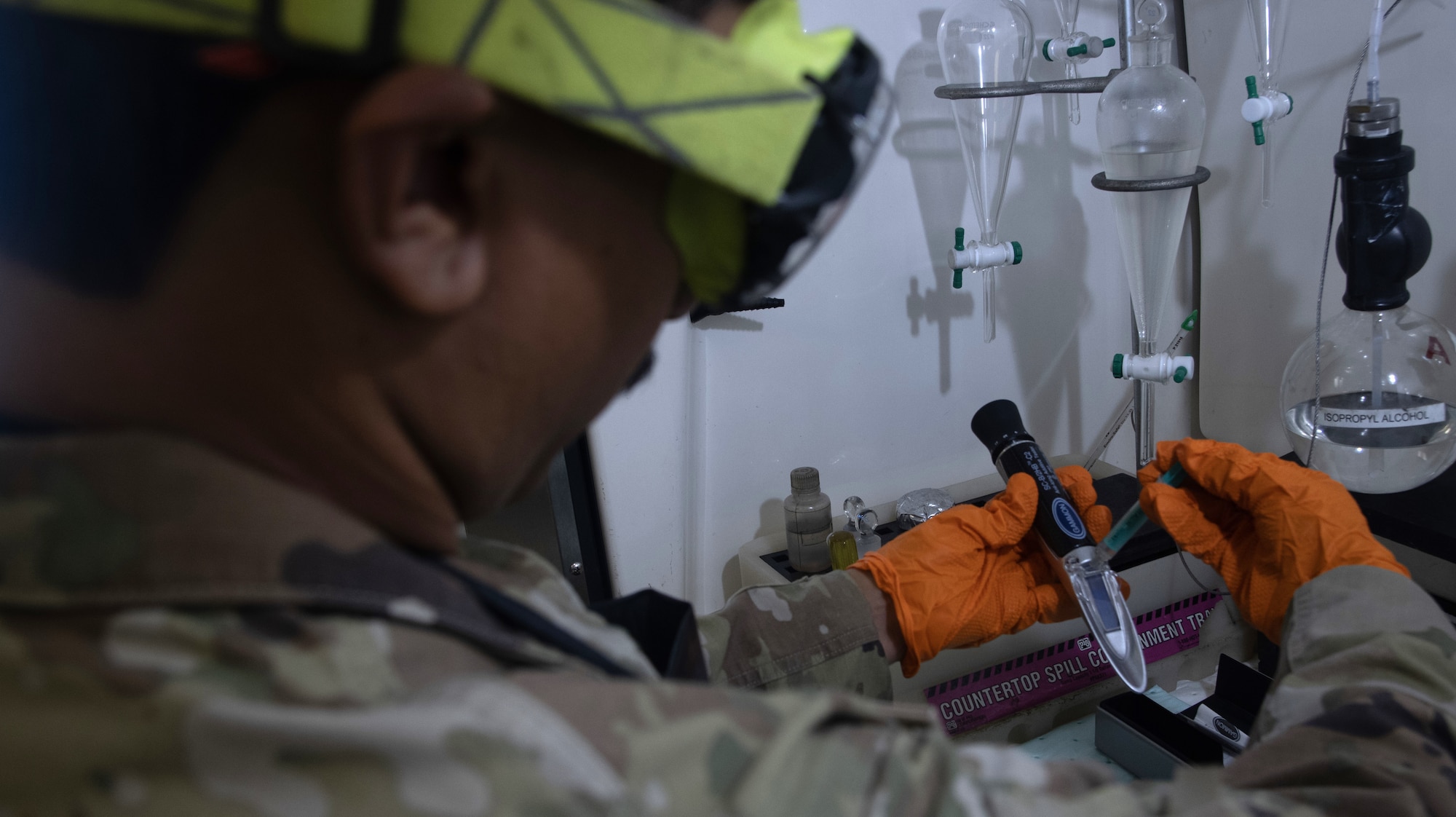 A fuels laboratory technician assigned to the 1st Special Operations Wing checks the refractometer for calibration with distilled water at Hurlburt Field, Florida, Aug. 7, 2025.