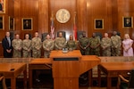 Air National Guard judge advocates and state partnership program attorneys pose for a photo inside the North Carolina Supreme Court, in Raleigh, North Carolina, July 31, 2025. The North Carolina Air National Guard judge advocates invited state partnership program attorneys from Malawi, Zambia, and Botswana to participate in a Mini African Military Legal Forum at the Charlotte Air National Guard Base on August 1-2, 2025.