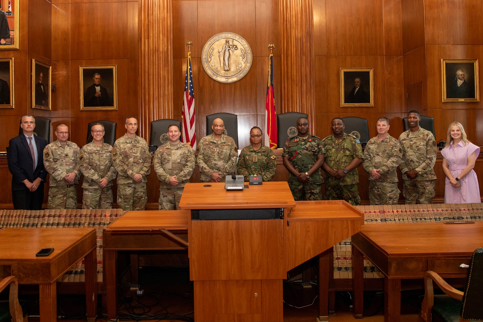 Air National Guard judge advocates and state partnership program attorneys pose for a photo inside the North Carolina Supreme Court, in Raleigh, North Carolina, July 31, 2025.