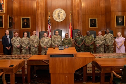 Air National Guard judge advocates and state partnership program attorneys pose for a photo inside the North Carolina Supreme Court, in Raleigh, North Carolina, July 31, 2025.