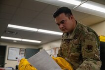 U.S. Air Force Tech. Sgt. Michael Goodwin, 9th Physiological Support Squadron (PSPTS) aircrew flight equipment technician, checks the integrity of one of the full pressure suits used by U-2 Dragon Lady pilots at Beale Air Force Base, California, July 29, 2025.