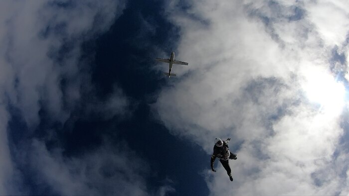 U.S. Air Force Tech. Sgt. Michael Goodwin, 9th Physiological Support Squadron aircrew flight equipment technician, skydives over the United Kingdom August 7, 2021.