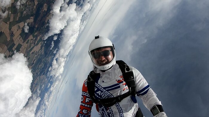 U.S. Air Force Tech. Sgt. Michael Goodwin, 9th Physiological Support Squadron aircrew flight equipment technician, skydives over the United Kingdom August 7, 2021.